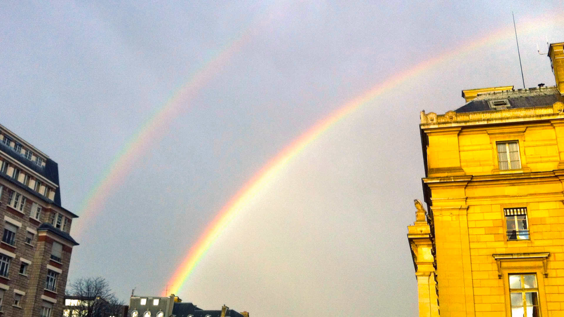 A rare double rainbow in Paris has to signify something positive, right?