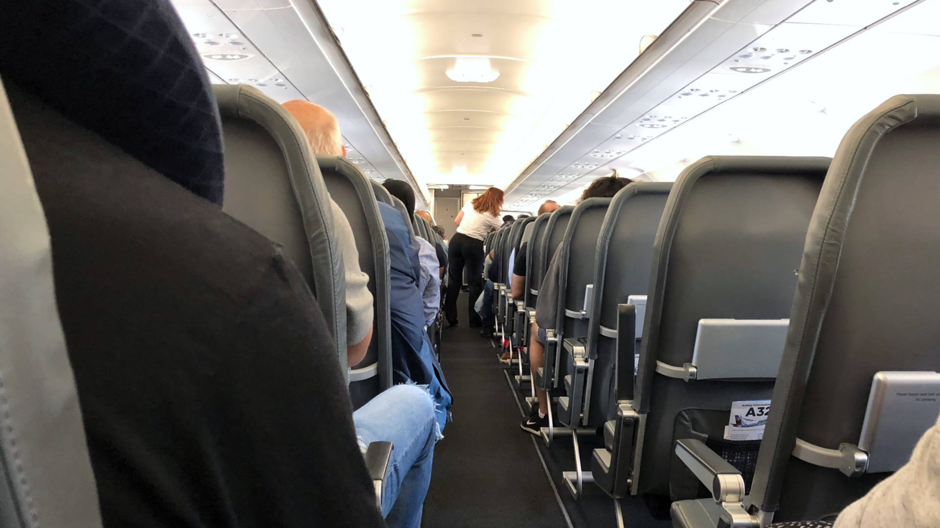 Neither of us have had this view for over a year: the airplane aisle! This was also our first time flying with Frontier Airlines.