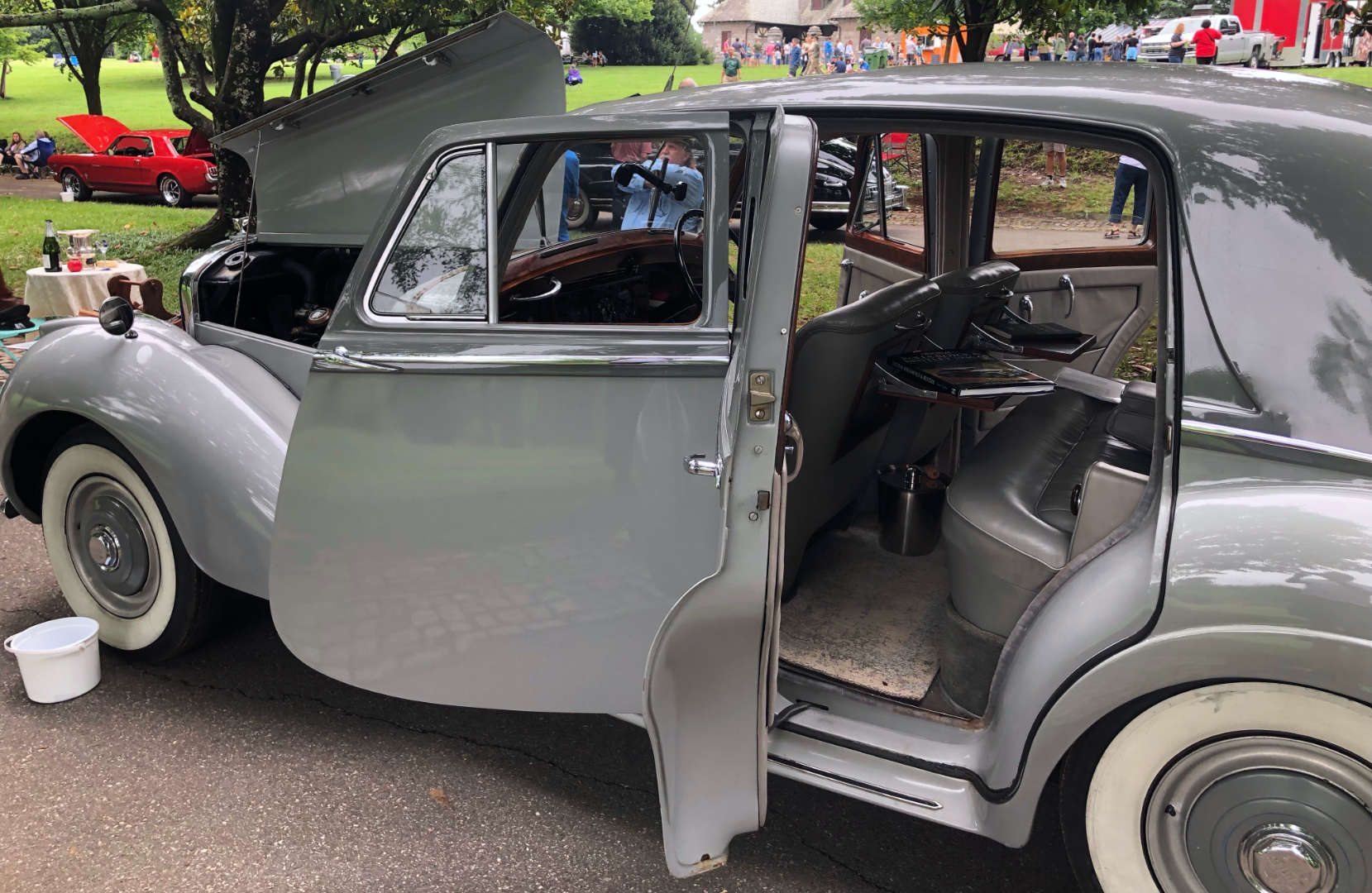 A little antique car show, time in a park, and wine? Count us in!