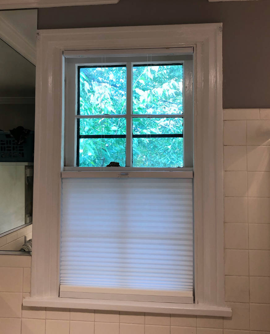 The finishing touch on Jenni's current round of bathroom projects: top down bottom up cellular shade!