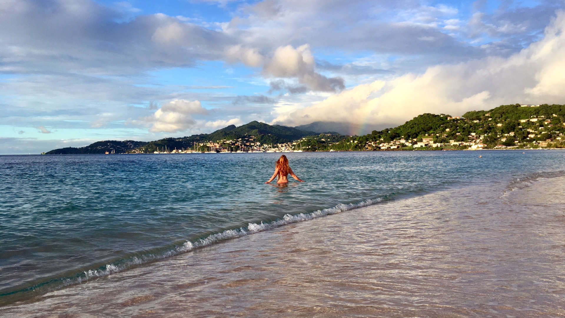 Those $2 minibus rides around Grenada were the adventure to contrast the incredible beauty we came for and feasted on. Jenni can attest this view across Grand Anse Beach, complete with a rainbow in St. George's harbor, was the extravagance we spent on to compliment our money mindset.