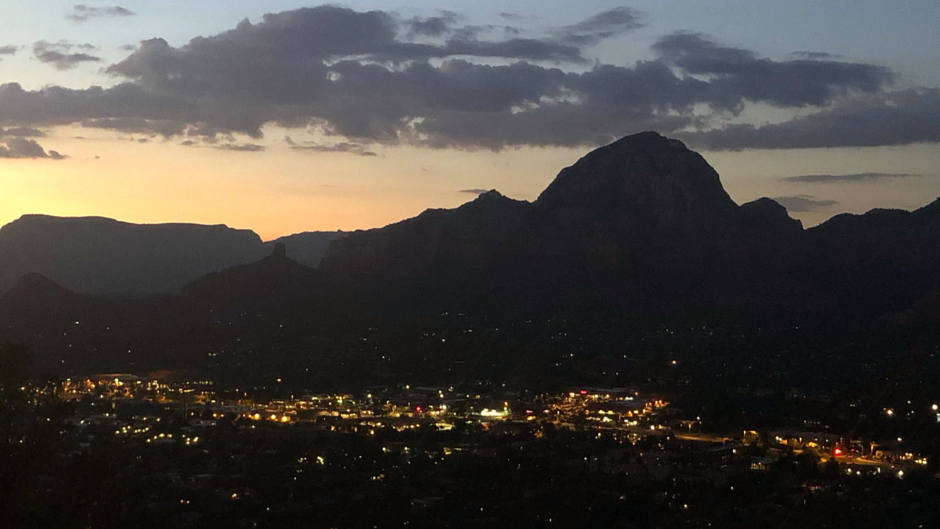 The sun escaping Sedona, leaving a trail of darkness as we set out on our hike.