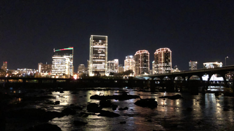 The river became illuminated by all the city's lights for the holidays.