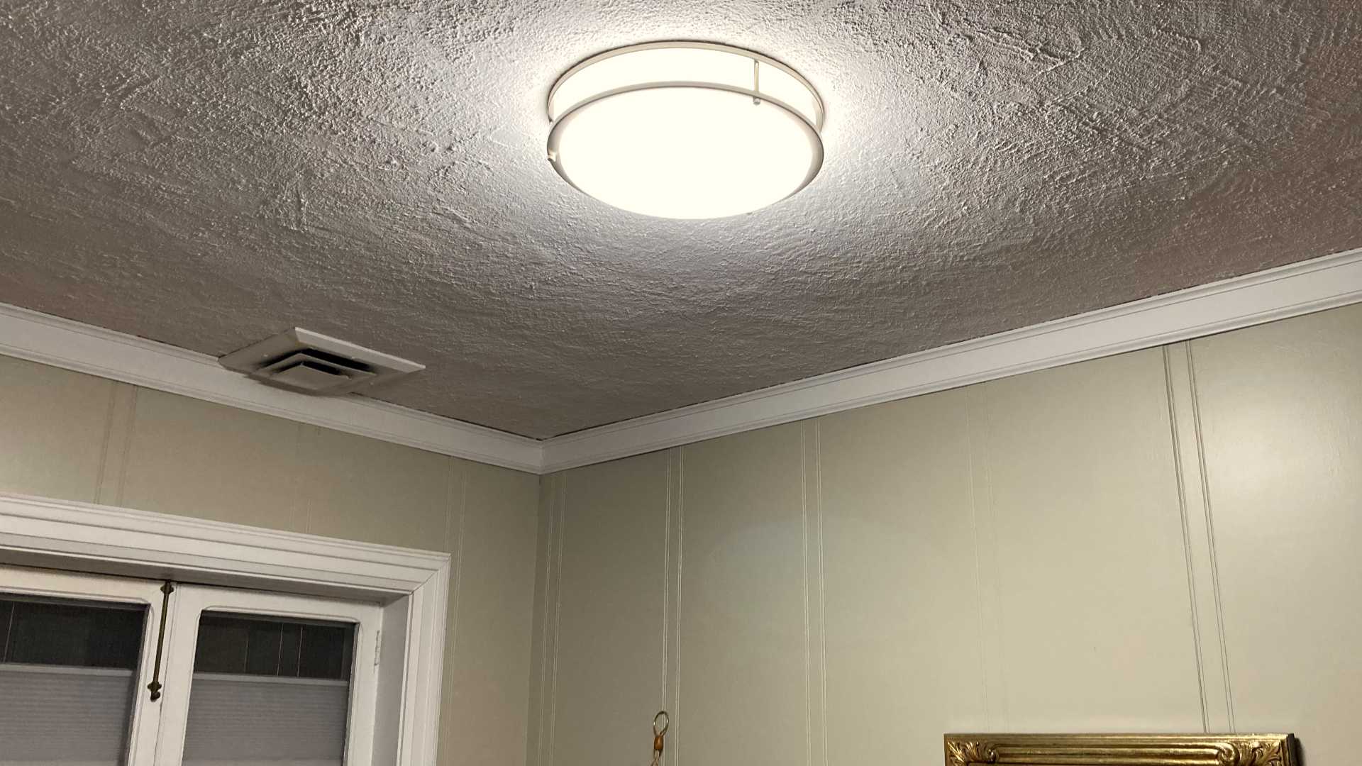 A new light fixture brightened up this multiuse room quite a bit!