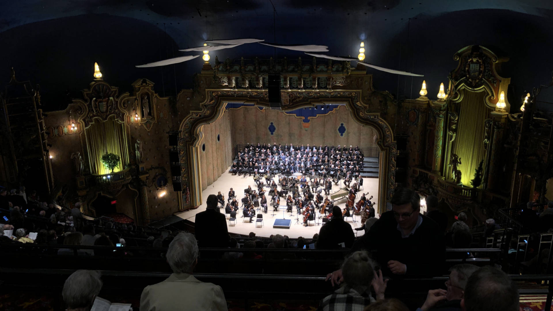 The Symphony Chorus on stage at a beautiful historic theater.