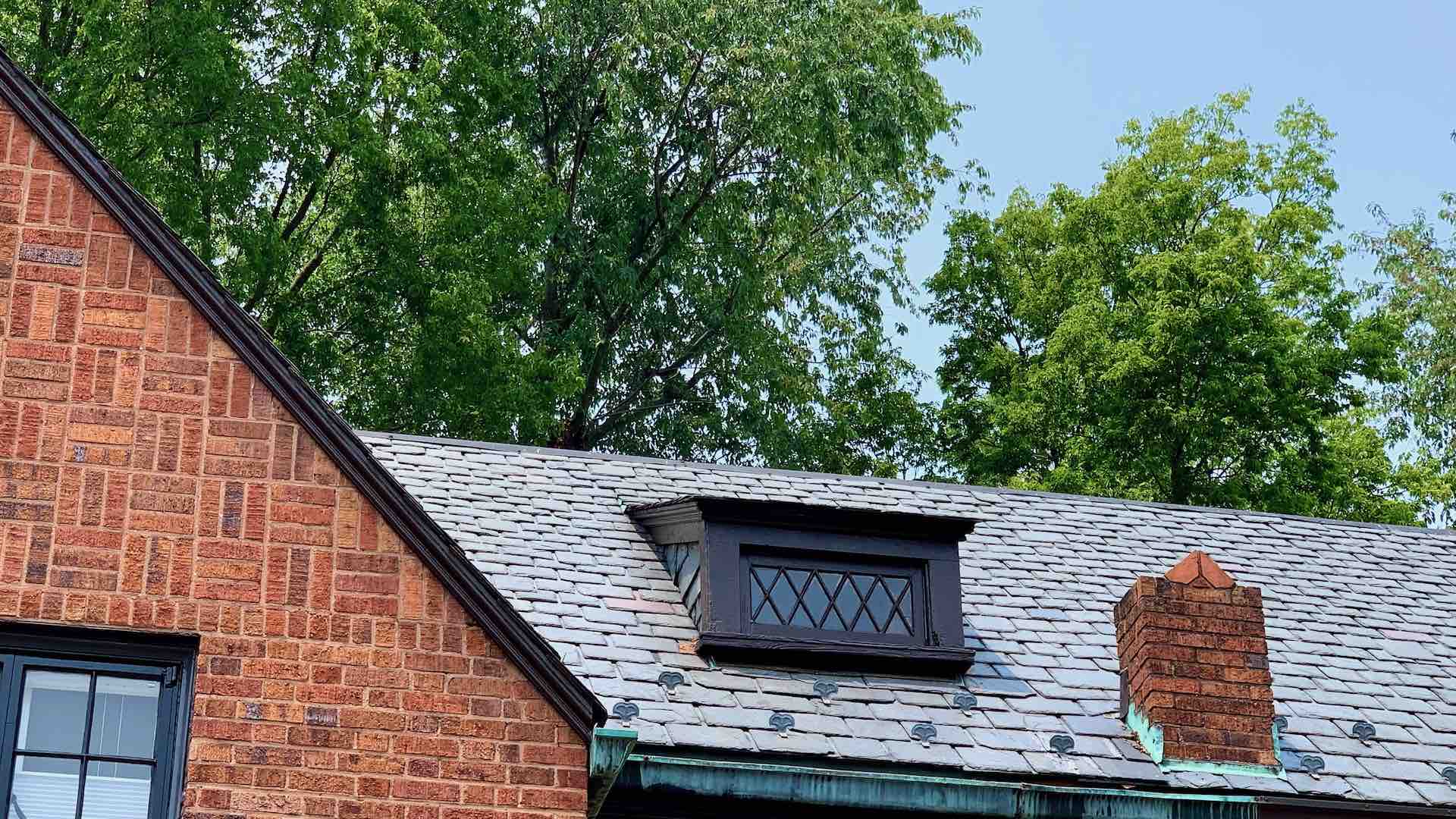 And—"after". The trim board has a consistent, clean painted appearance that matches the rest of the finishes. The window frame still has some visible damage (bottom right), but this seems to have been merely cosmetic. The wood remains durable.