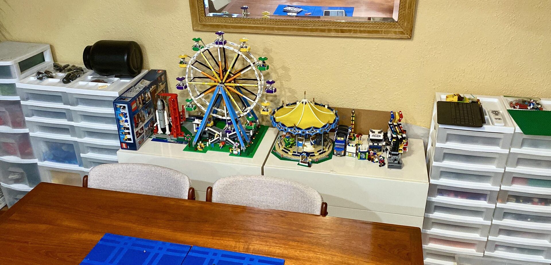 Our little brick sorting drawers and collection coming together. Plus some spring-friendly amusement park sets we had out!