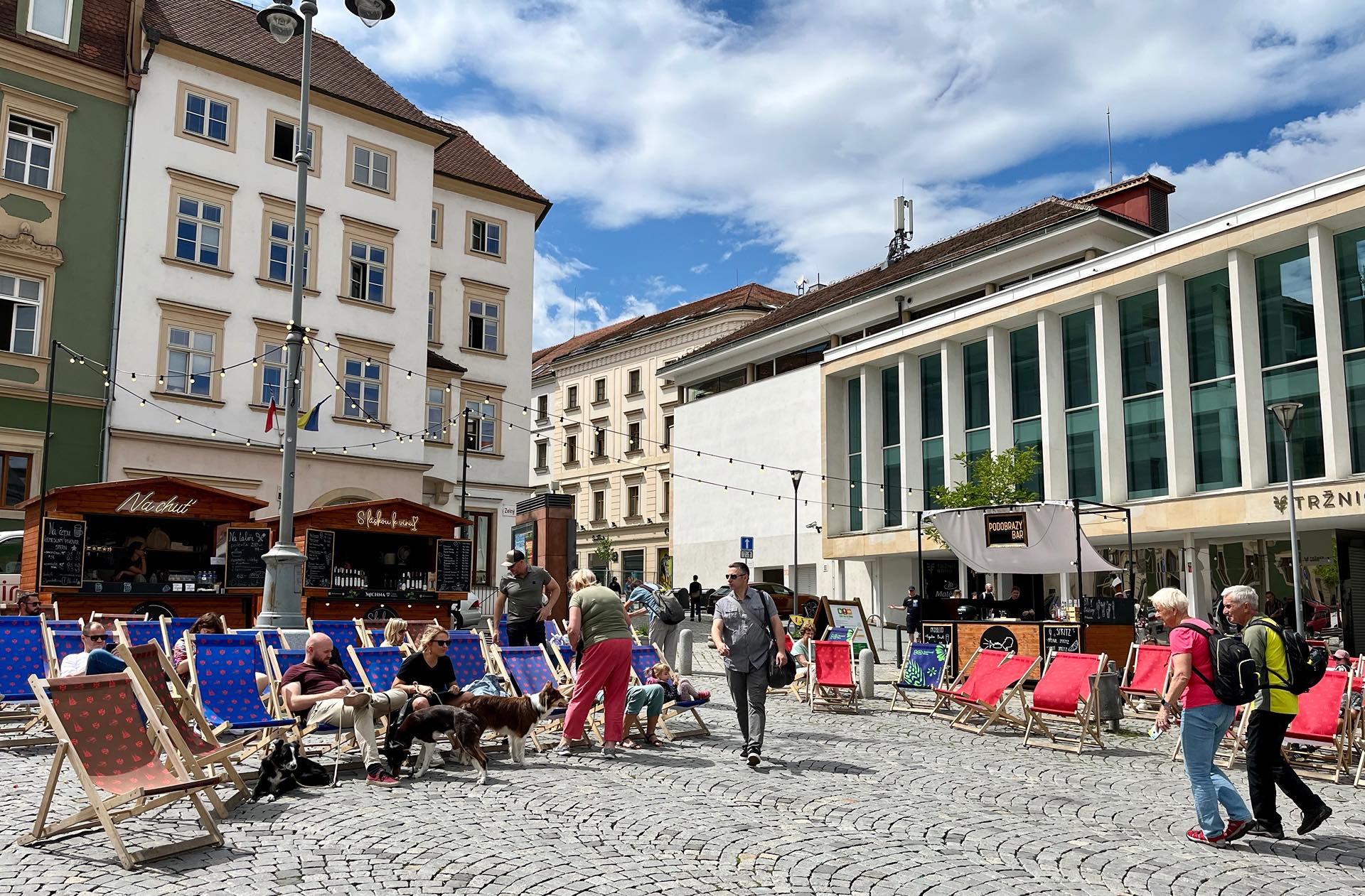 Taking in lovely city squares and all the folks going by costs nothing!