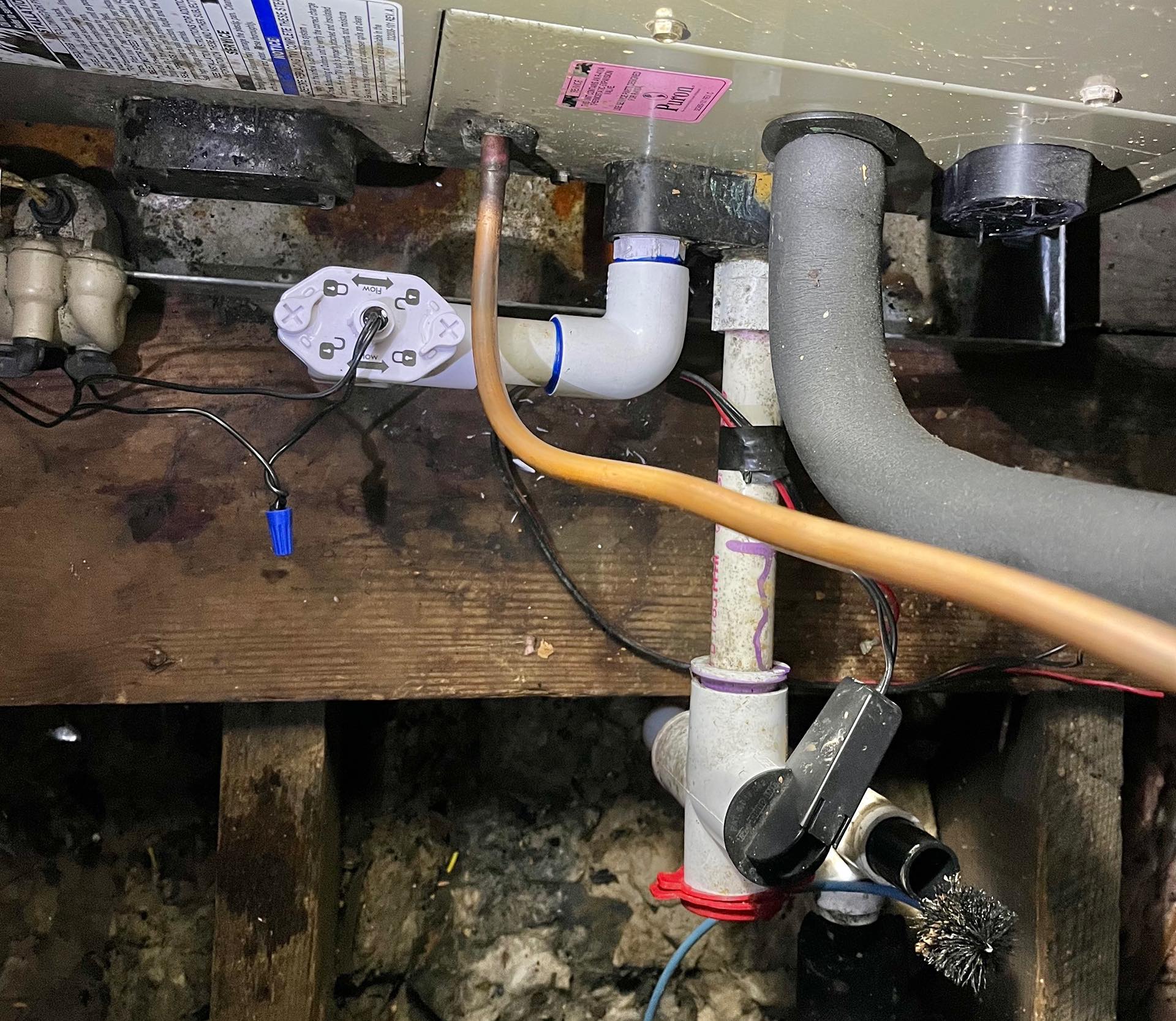 A new electronic sensor on our air handler's auxiliary/secondary drain that...was a failed unit. What luck!