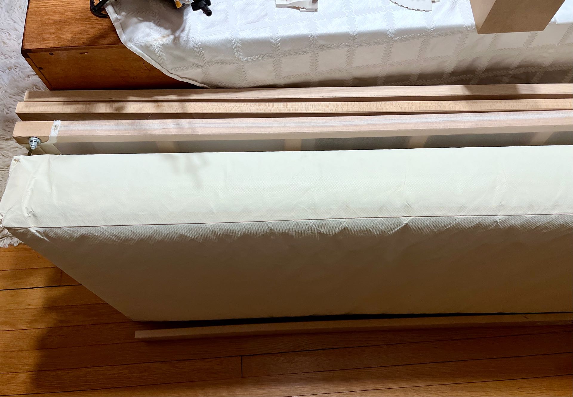 Our first baby-specific purchase—a crib! This Ikea singular model is built with a safe, unfinished wood. Simple!