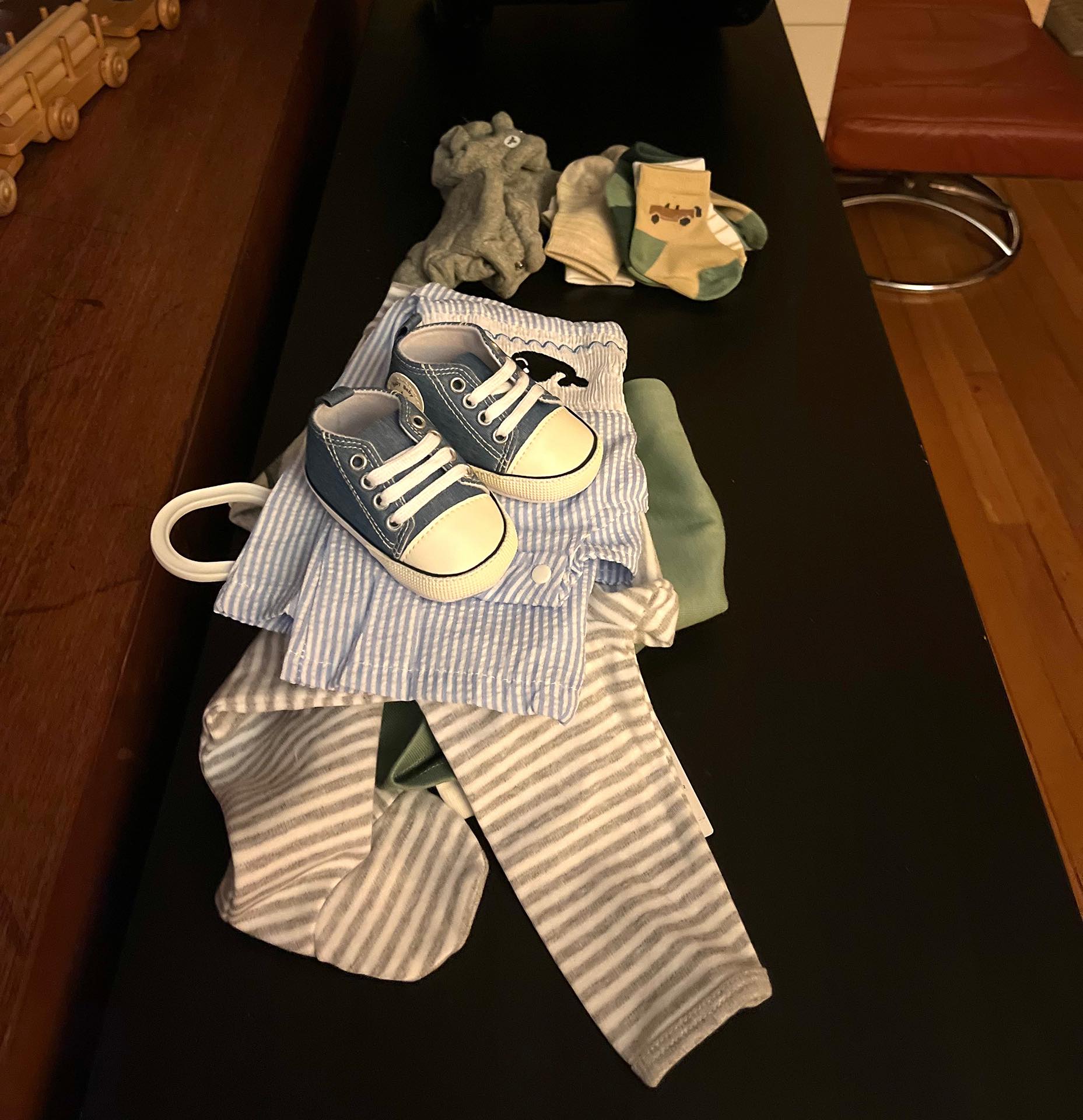 Some of the many, many little outfits, onesies, sleep sacks, diapers, and so many more wearables we've received as gifts from friends, family, and neighbors. We've hardly even had the opportunity to buy our own!