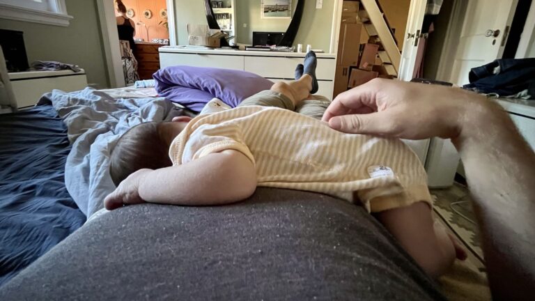 Less than three days old, Lukas snoozing along on Dad's belly. :-)