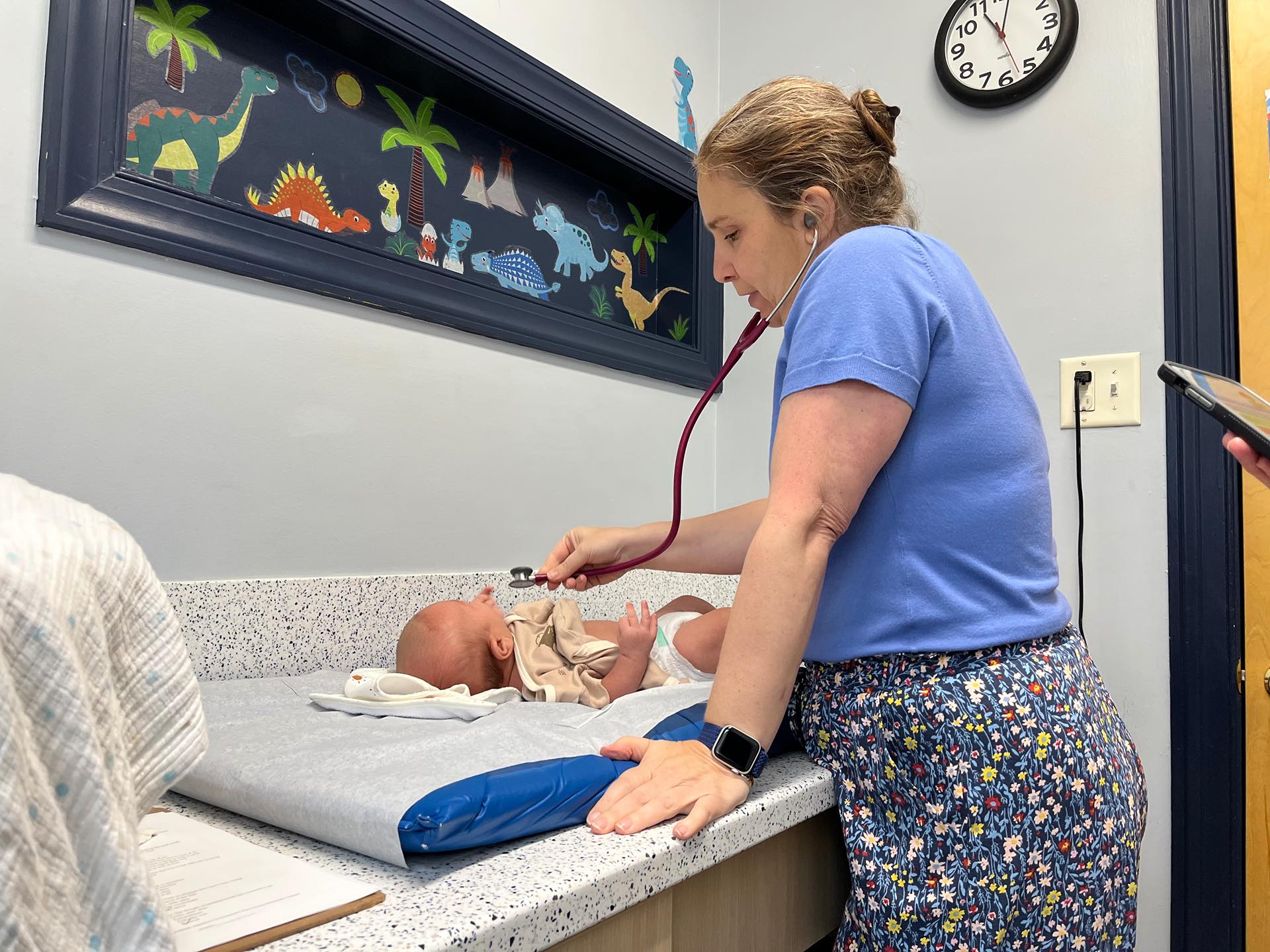 Lukas's fantastic pediatrician giving him the full checkup.